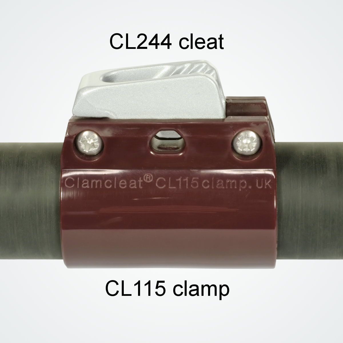 Стопор щелевой для гика Clamcleat Unifiber CL244S1 c нейлоновым зажимом стрелы 36-37мм для троса Ø3-5мм 42x22x20мм из серого алюминия