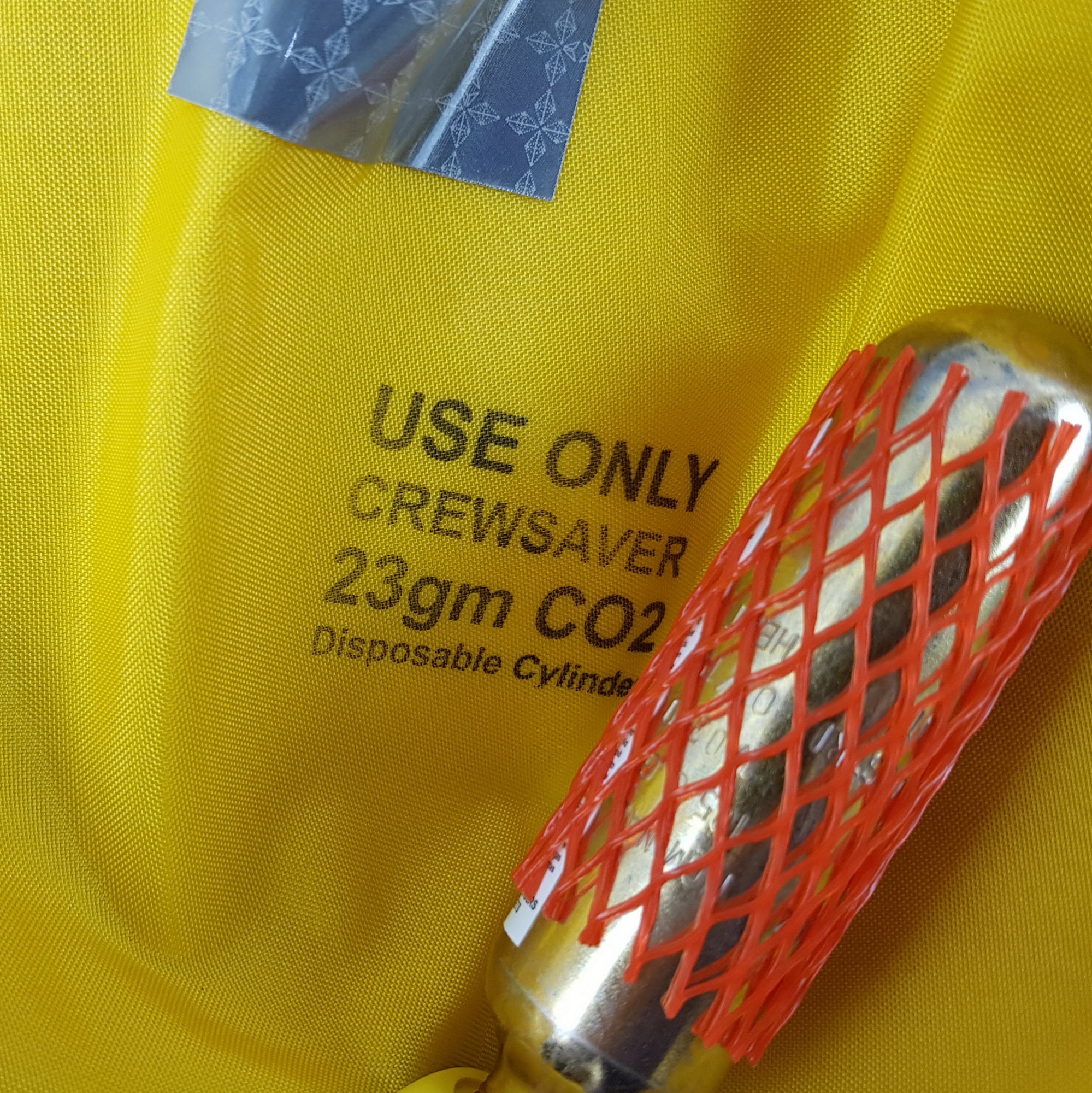 Купить Детский спасательный жилет CrewSaver CrewFit 150N Junior 9705BA голубой с автоматическим пусковым механизмом и возможностью крепления страховки 7ft.ru в интернет магазине Семь Футов