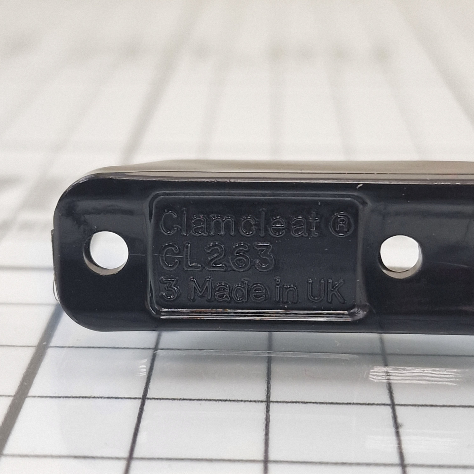 Купить Стопор щелевой с направляющей Clamcleat CL263 Micros 44x13x16мм для тросов Ø1-4мм из чёрного нейлона 7ft.ru в интернет магазине Семь Футов