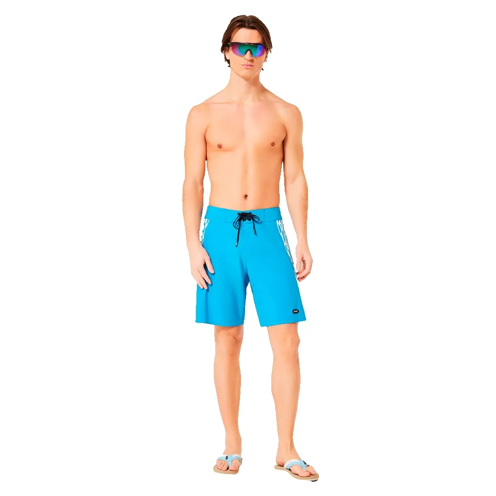 Купить Oakley FOA406219-6GE-34 плавательные шорты Quiver rc 19´´ boardshort Swimming Blue 34 7ft.ru в интернет магазине Семь Футов