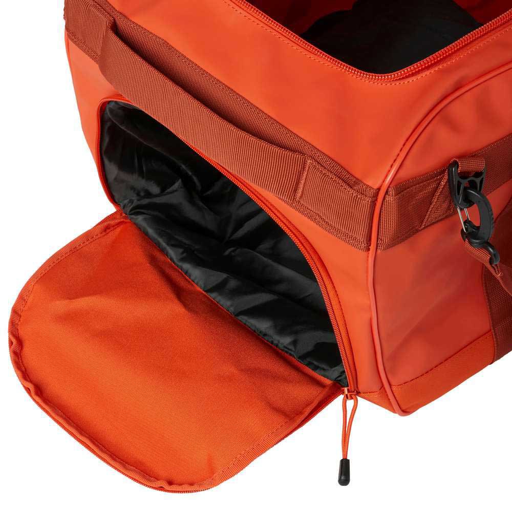 Купить Спортивная сумка Helly Hansen Scout Duffel XL 67443_301-STD 730x350x350мм 90л 1450г цвет Patrol Orange 7ft.ru в интернет магазине Семь Футов